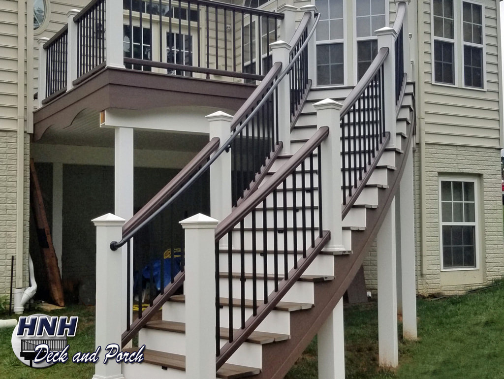 Trex Transcend composite deck with curved staircase.
