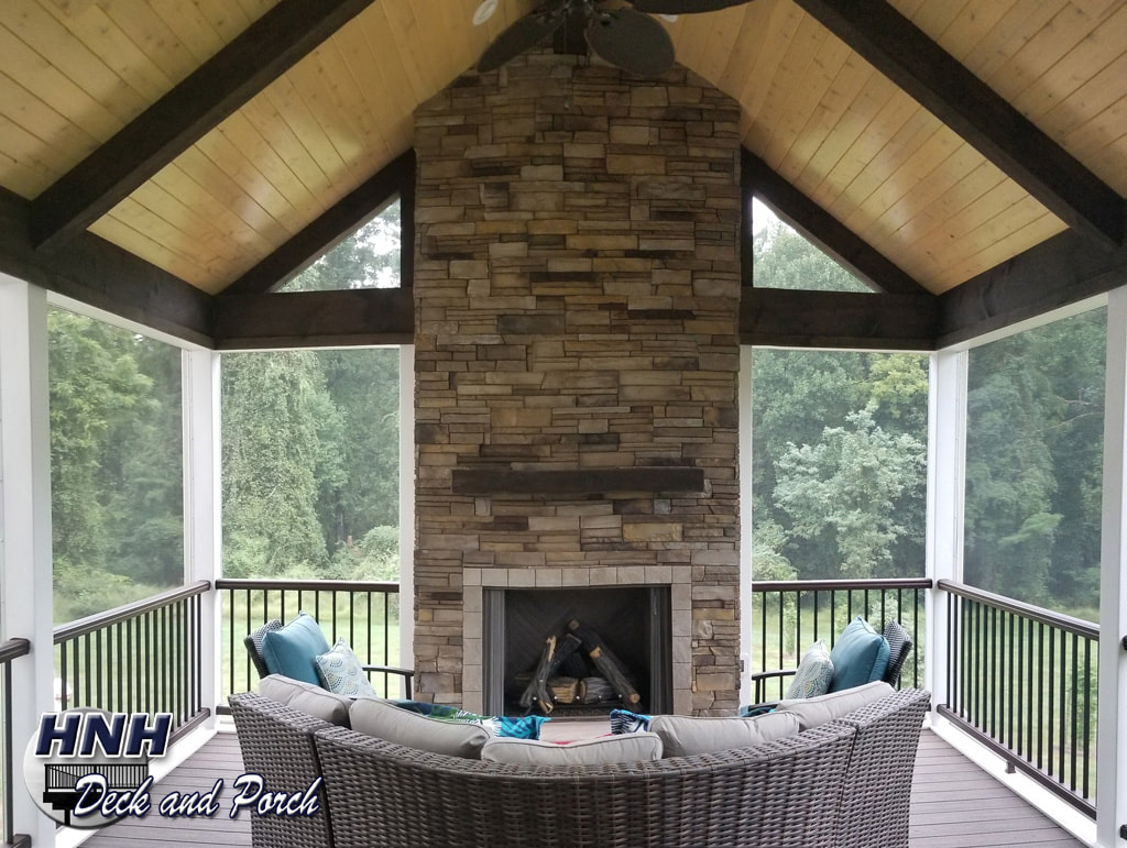 Low maintenance porch with fireplace and Versetta Stone.