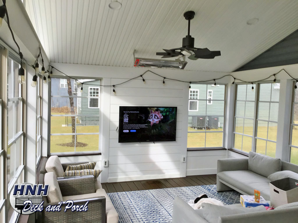 3 season room with TV wall and infrared heater