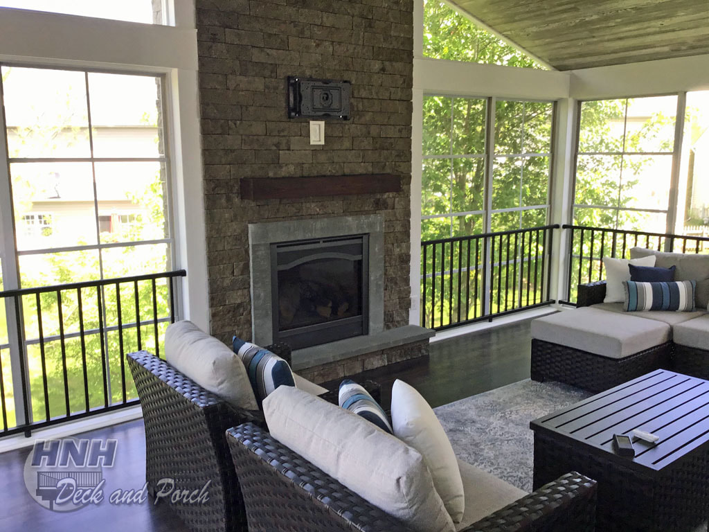 3 season room with gas fire place and Evolve Stone