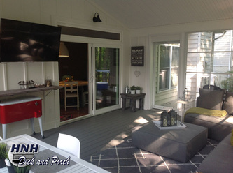 Screened porch with Eze-Breeze sliding panels and bar top.
