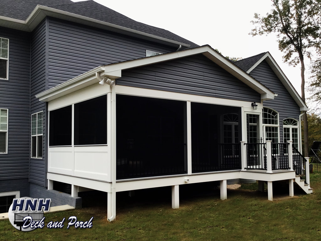 Screened porch with closed gable and siding to match house.
